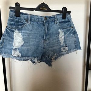 Light wash ripped jean shorts
